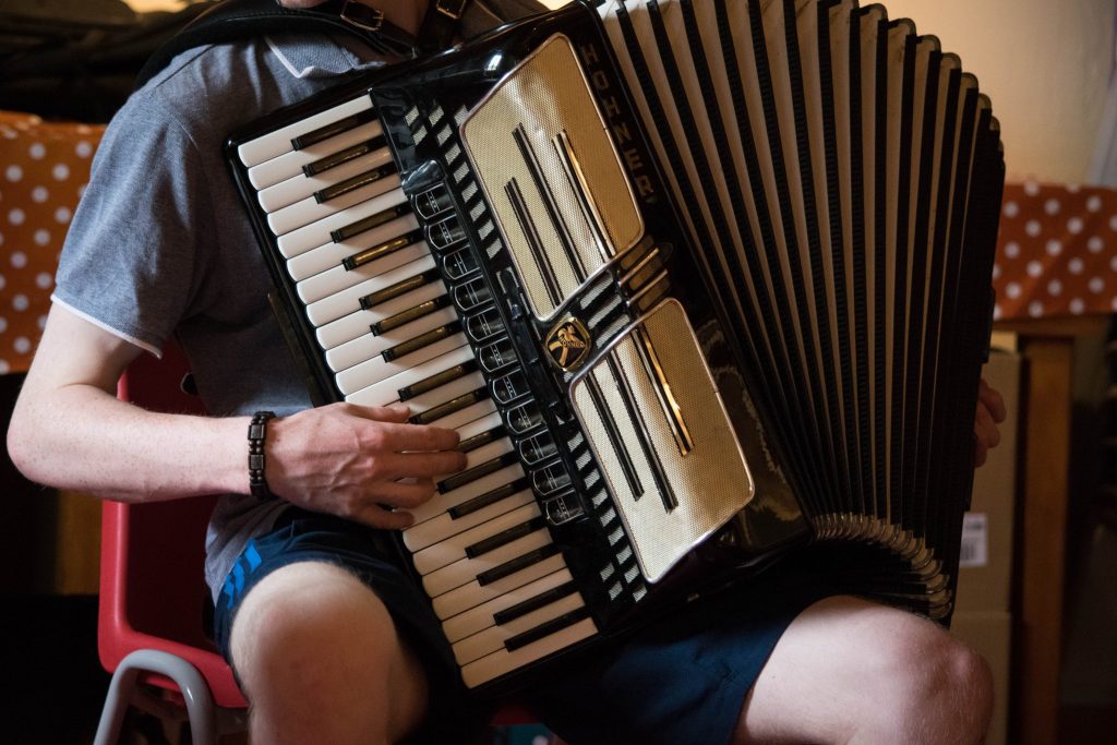 Young Person playing the Accordion